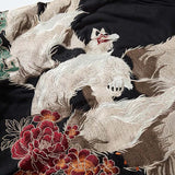 KAPUZENPULLI MIT NEUN SCHWÄNZEN UND STICKEREI