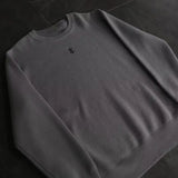 STRICKPULLOVER MIT SKELETTFLAMMEN