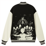 Baseball varsity jacket with long sleeves, one side in cream color and the other in black with a white graphic print of a character.