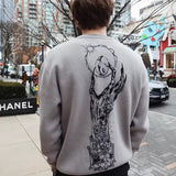 STRICKPULLOVER MIT SKELETTFLAMMEN