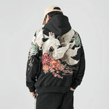 KAPUZENPULLI MIT NEUN SCHWÄNZEN UND STICKEREI