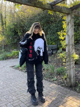 EINÄUGIGER STRICKPULLOVER