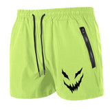 Bright green shorts with a black zipper pocket and logo on a white background