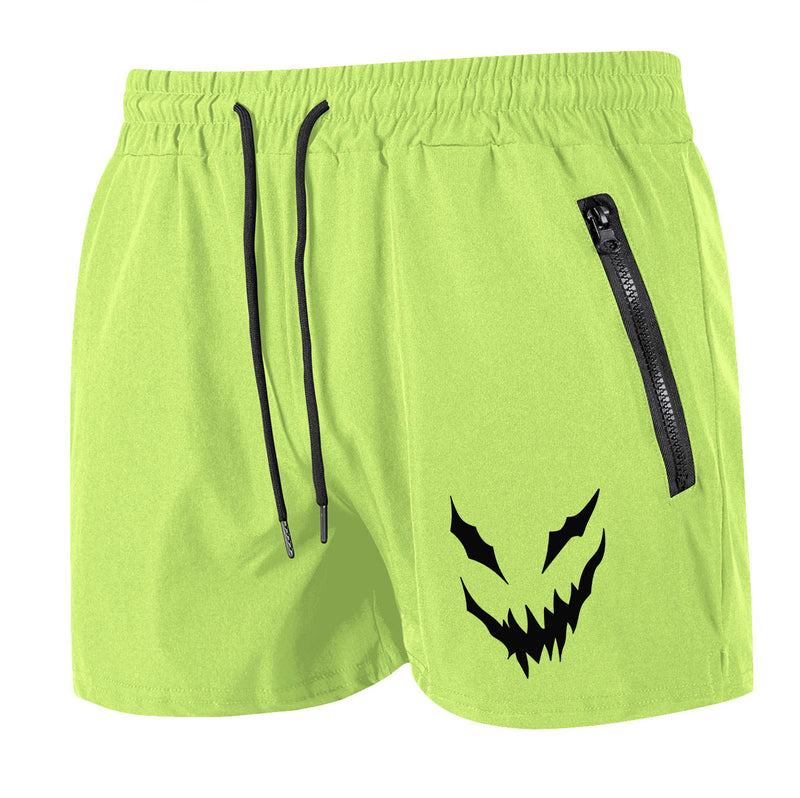 Bright green shorts with a black zipper pocket and logo on a white background
