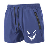 Blue shorts with a white graphic design on a white background